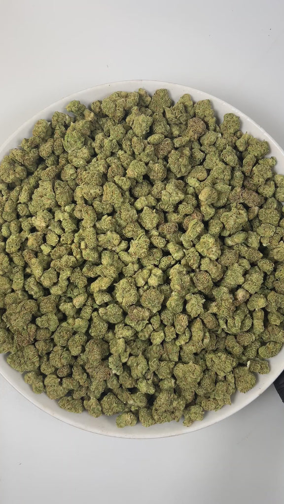 PUFFY Cheetah Piss (smalls) is a balanced hybrid THCa strain, expertly bred from a powerhouse trio: Lemonnade, Gelato 42, and London Poundcake 97. The aroma is a sharp and zesty blend of lime, pungent skunk, and bold chemical notes. Visually, the dense, vibrant green buds are frosted with trichomes, accented by orange pistils and occasional subtle purple hues. Consumers often experience an uplifting rush that sharpens focus and brings euphoric clarity, making social interactions effortless and tasks easier,