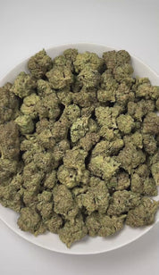 PUFFY Ice Cream Cookies is an indica-dominant hybrid THCa strain, created from the celebrated cross of Gelato 33 and Wedding Cake. The aroma entices the senses with a luscious blend of creamy richness, juicy fruit sweetness, and a smooth vanilla finish. Visually dense and frosty buds, vibrant forest green with deep purple hues and orange pistils, coated in thick white trichomes. Consumers often describe the experience as an uplifting cerebral euphoria that boosts mood and creativity, followed by a deep phys