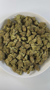 PUFFY Cherry Pie is an indica-dominant hybrid THCa strain born from the flavorful cross between Granddaddy Purple and an F1 Durban Poison. The aroma opens with rich earthy tones, layered with fresh herbal notes and subtle woody undertones. Visually, it boasts dense, sticky buds that range from deep green to rich purple, accented by vibrant orange pistils and a generous dusting of frosty trichomes. Consumers often report feeling euphoric, happy, and deeply relaxed after, with some experiencing bursts of crea