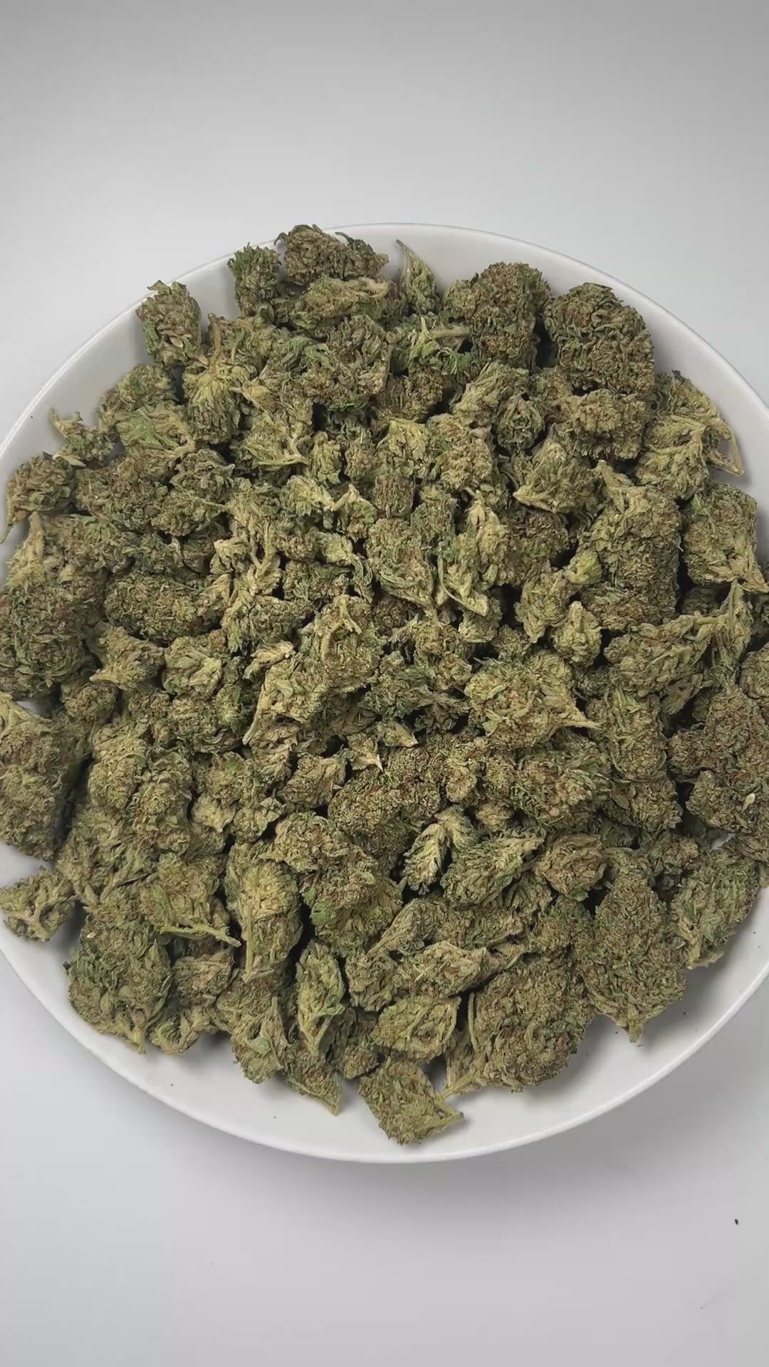 PUFFY Sour Diesel is a sativa-dominant hybrid THCa strain born from the pairing of Chemdawg and Super Skunk. The aroma carries a strong earthy base layered with pungent diesel notes and a sharp hint of chemical undertones, creating a bold and intense scent profile. Visually, this strain features dense light-green buds accented by vibrant orange pistils and a thick, frosty layer of trichomes. Consumers often report that this strain enhances mood, sharpens focus, and sparks creativity with its uplifting, cere