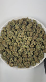 PUFFY Supreme OG is an indica-dominant hybrid THCa strain, often recognized as a standout within the OG Kush family; this strain carries the hallmark traits of its legendary lineage. The aroma bursts with zesty lemon, crisp pine, and a distinct gassy edge. Visually, the dense, grape-shaped buds display rich emerald to forest-green hues, bright orange pistils, and a frosty coating of trichomes. Consumers often report an initial burst of mental clarity and uplifted mood, sparking creativity and sociability, w