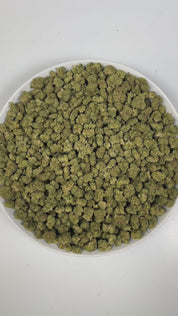 PUFFY Blue Andeze (smalls) is a balanced hybrid THCa strain born from the legendary cross of Thin Mint Girl Scout Cookies and DJ Short Blueberry. The aroma presents a bold blend of sweet blueberries, sharp chemical notes, and a distinct tar-like undertone. Visually, dense deep green buds with purple hues and fiery orange pistils are coated in sticky trichomes. Consumers often report a euphoric and uplifting experience paired with soothing, deep relaxation that can help relieve stress and unwind.