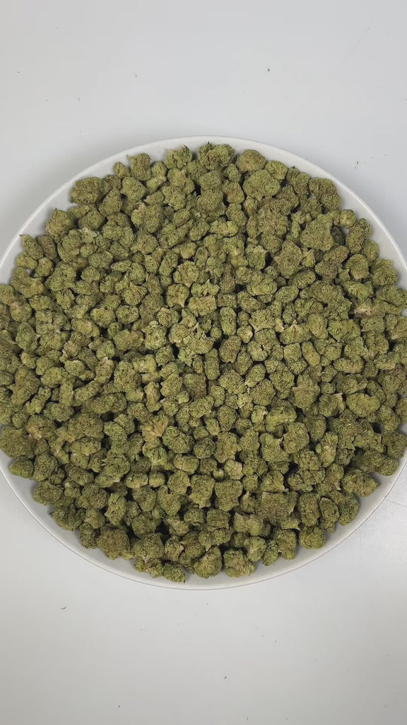 PUFFY Blue Andeze (smalls) is a balanced hybrid THCa strain born from the legendary cross of Thin Mint Girl Scout Cookies and DJ Short Blueberry. The aroma presents a bold blend of sweet blueberries, sharp chemical notes, and a distinct tar-like undertone. Visually, dense deep green buds with purple hues and fiery orange pistils are coated in sticky trichomes. Consumers often report a euphoric and uplifting experience paired with soothing, deep relaxation that can help relieve stress and unwind.