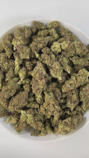 PUFFY King Louis  is an indica-dominant hybrid THCa strain, crafted from the legendary lineage of OG Kush × LA Confidential. The aroma hits with the sharp, penetrating punch of pure gasoline, delivering an intense and unmistakably bold profile. Visually, the buds are dense and dark green with bright orange pistils and a sparkling, sticky trichome coat. Consumers often report a powerful body high that eases into deep relaxation, pairing euphoric calm with a soothing finish that makes it best suited for eveni