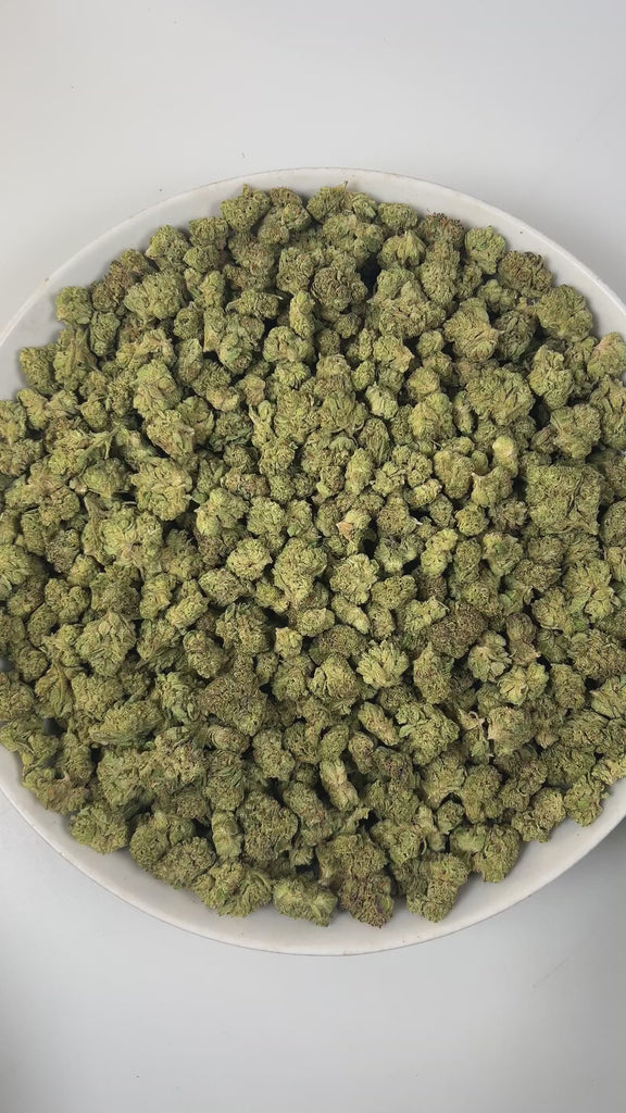 PUFFY Jelly Cake (smalls) is an indica-dominant hybrid THCa strain resulting from a masterful cross between Biscotti and Sunset Sherbet. The aroma is a luscious combination of creamy richness, ripe berries, and velvety vanilla. The buds are dense and chunky with deep green and purple hues, bright orange pistils, and a thick layer of sticky white trichomes. Consumers frequently describe a euphoric mental uplift that slowly transitions into soothing, full-body calm, often leaving them cheerful, mellow, and wi