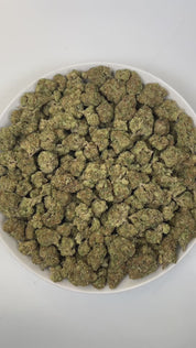 PUFFY Bacio Gelato is a balanced hybrid THCa strain born from the legendary cross of Sunset Sherbert and Thin Mint Girl Scout Cookies. The aroma is gassy, layered with earthy thyme and crisp pine, delivering a sharp yet refreshing sensory kick. Visually, buds are dense and chunky, with forest green and purple tones, fiery orange pistils, and a frosty trichome coating. Consumers describe it as gentle yet uplifting, providing clear-headed calm and a subtle mood boost that eases tension while keeping you prese