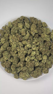 PUFFY Sour Breath is a sativa-dominant hybrid THCa strain, created from a cross between Sour Diesel and Lamb’s Bread. The aroma bursts with bright sour notes balanced by zesty citrus and subtle floral undertones. Visually, it features dense neon-green buds with orange pistils and a frosty layer of white trichomes. Consumers often report an uplifting and energetic high that boosts focus, sparks creativity, and enhances sociability, perfect for daytime use or lively social settings.
