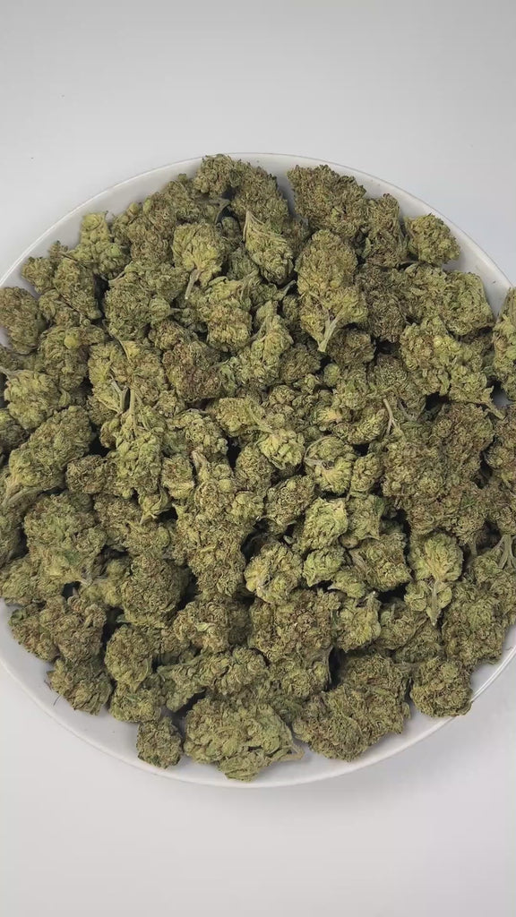 PUFFY Sour Breath is a sativa-dominant hybrid THCa strain, created from a cross between Sour Diesel and Lamb’s Bread. The aroma bursts with bright sour notes balanced by zesty citrus and subtle floral undertones. Visually, it features dense neon-green buds with orange pistils and a frosty layer of white trichomes. Consumers often report an uplifting and energetic high that boosts focus, sparks creativity, and enhances sociability, perfect for daytime use or lively social settings.
