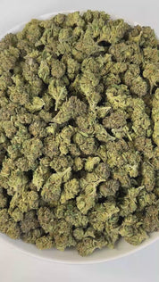 PUFFY Bacio Gelato is a premium balanced hybrid THCa strain born from the legendary cross of Sunset Sherbert and Thin Mint Girl Scout Cookies. The aroma is a rich blend of fruity sweetness and creamy smoothness, brightened by a refreshing citrus twist. Visually, buds are dense and chunky, with forest green and purple tones, fiery orange pistils, and a frosty trichome coating. Consumers describe it as gentle yet uplifting, providing clear-headed calm and a subtle mood boost that eases tension while keeping y