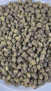 PUFFY Midnight Runtz (smalls) is an indica-dominant THCa strain, bred from a powerhouse cross of Runtz with Funky Charms. The aroma bursts with sweet and fruity notes, balanced by a warm hint of spice and grounded in a rich, earthy undertone. Visually, the blooms burst with lush emerald and royal purple hues, laced with vivid orange pistils and dusted in a glistening blanket of crystal-like trichomes. Consumers often describe it as delivering a rush of creative energy and elevated mood, sparking euphoria wh