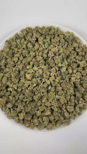 PUFFY Purple Punch (smalls) is a popular indica-dominant hybrid THCa strain, born from the legendary pairing of Granddaddy Purple and Larry OG. The aroma bursts with sweet berry notes, layered with a gassy undertone and a playful hint of candy, creating a lively and inviting scent experience. Visually, the buds are thick and tightly packed, with a lush green backdrop streaked by vivid purples and violets, intertwined with fiery orange pistils and finished with a shimmering coat of crystalline trichomes. Con