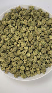 PUFFY Purple Punch is a popular indica-dominant hybrid THCa strain, born from the legendary pairing of Granddaddy Purple and Larry OG. The aroma opens with cool menthol, rounded by sweet grape, and finished with a bold, gassy punch. Visually, the buds are thick and tightly packed, with a lush green backdrop streaked by vivid purples and violets, intertwined with fiery orange pistils and finished with a shimmering coat of crystalline trichomes. Consumers often experience an initial wave of cerebral euphoria 