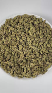 PUFFY Chemlato (smalls) is a balanced hybrid THCa strain, born from the cross of Gelato #33 and Chemdawg. The aroma opens with bright citrus notes, layered with a sharp fuel-like edge and a deeply pungent finish. Visually, the buds are dense, featuring light green and purple hues, vibrant orange pistils, and a sparkling layer of trichomes. Consumers often report an initial uplifting and euphoric mental high that sparks creativity, gradually transitioning into a calm and mellow body sensation.
