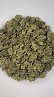 PUFFY Blue Dream is a sativa-dominant hybrid THCa strain born from the legendary cross between Blueberry and Haze. The aroma combines sweet berry and zesty citrus notes with a bold hint of diesel, creating a vibrant and memorable scent. Visually stunning, its dense, bright green buds are accented by deep blue hues, fiery orange pistils, and a generous dusting of icy trichomes making it as eye-catching as it is effective. Consumers often report a euphoric, uplifting head high that flows into a gentle, motiva