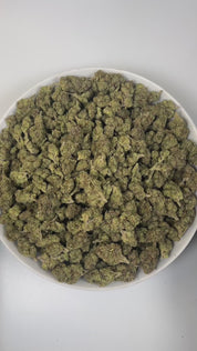 PUFFY Bolo Runtz is an indica-dominant hybrid THCa strain, born from the legendary pairing of Gelato and ZKZ. The aroma bursts with sweet candy, zesty citrus, and a subtle gassy undertone that lingers enticingly. Visually, the buds are dense and vibrant, showcasing vivid green and deep purple hues, accented by bright orange pistils and a generous coating of sparkling trichomes. Consumers often report a balanced high that begins with a euphoric cerebral lift and gradually settles into a soothing body effect.