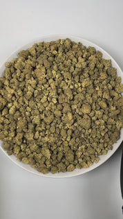 
PUFFY Sour OG (smalls) is a balanced hybrid THCa strain, born from the cross of Sour Diesel and OG Kush. The aroma bursts with zesty lemon notes, layered with pungent gassy undertones and a deep, earthy dankness that lingers. Visually striking, these dense buds feature deep green tones with purple accents, dotted with orange pistils and a sparkling trichome coating. Consumers often report an initial euphoric head high that gradually flows into a soothing, relaxed body sensation, leaving them feeling blissf