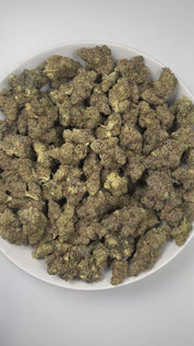 PUFFY Mendo Breath is an indica-dominant hybrid THCa strain, created from a cross between OG Kush Breath and Mendo Montage. The aroma bursts with a bold blend of herbal freshness, spicy pepper notes, and a deep diesel undertone that ignites the senses with every whiff. Visually, the buds are dense and minty-green with hints of purple, accented by vibrant orange pistils and a frosty coating of sparkling trichomes. Consumers often report an uplifting euphoria that sparks creativity and sociability, paired wit