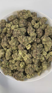 PUFFY Grape Sundae is a well-balanced hybrid THCa strain born from the flavorful cross of Sundae Driver and Grape Pie Bx. The aroma unfolds with sweet cake notes layered with smooth vanilla and a subtle hint of ripe grape, creating a rich and indulgent profile. Visually, the buds are stunning showcasing deep violet and emerald green hues, generously coated in a frosty layer of trichomes. Consumers often report a euphoric uplift paired with enhanced creativity and focus, followed by a soothing body relaxatio