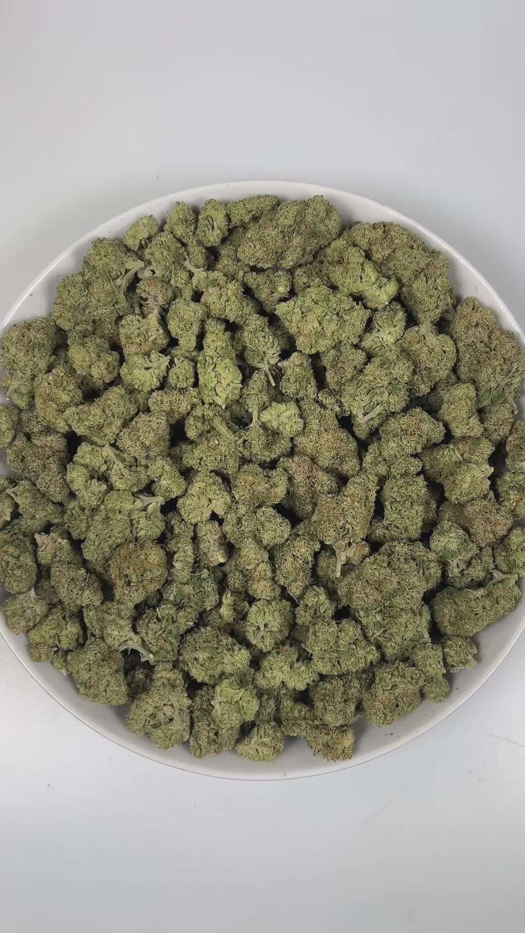 PUFFY Triangle Kush is an indica-dominant hybrid THCa strain, born from a powerful cross between Florida OG Kush and Hindu Kush. The aroma bursts with zesty lime notes, grounded by earthy undertones and a bold, pungent finish that lingers enticingly. Visually, dense deep green buds with purple hues and fiery orange pistils are coated in sticky trichomes. Consumers frequently describe effects that begin with a calming body sensation that helps ease stress and anxiety, followed by an uplifting cerebral high t