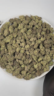 PUFFY Purple Urkle is an indica-dominant hybrid THCa strain, born from the cross of Mendo Purps and Granddaddy Purple. The aroma opens with sweet berry notes, balanced by a fresh grassy undertone and a smooth, creamy hint of vanilla. Visually appealing, the buds are dense with forest-green and purple hues, bright orange pistils, and a sparkling layer of trichomes. Consumers often report deep body relaxation that promotes restful sleep, often accompanied by uplifting euphoria and a heightened appetite.