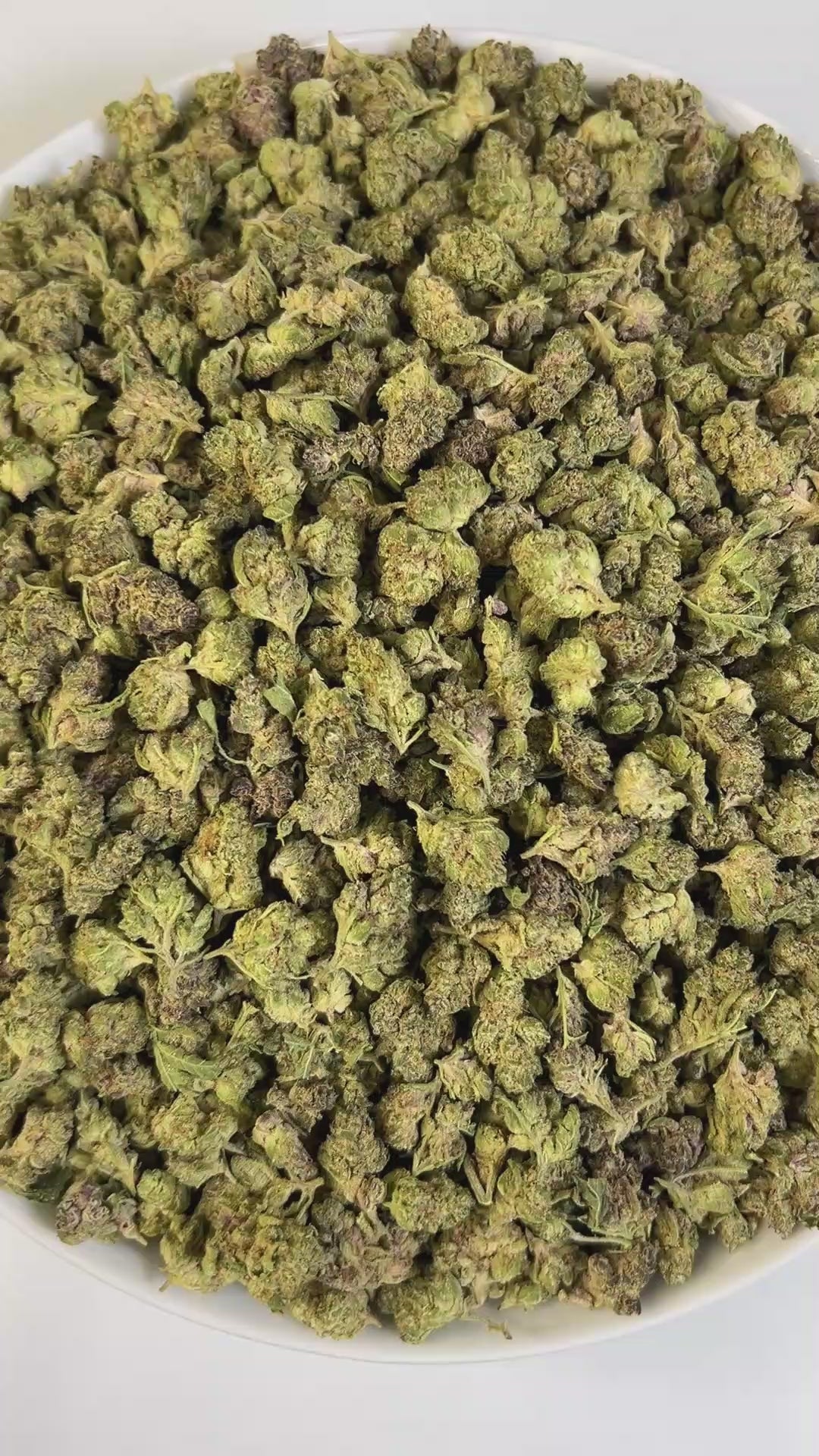 PUFFY Cookie Crumble Smalls is an indica-dominant hybrid THCa strain, expertly crafted from a flavorful cross between Cherry Pie and Girl Scout Cookies. The aroma is richly sweet and fruity, layered with creamy, nutty undertones that evoke the scent of freshly baked cookies with a hint of berry. Visually, the buds are dense and chunky with emerald and purple hues, bright orange pistils, and a frosty trichome coating that gives a sugary, cookie-like appearance. Consumers frequently describe an initial wave o