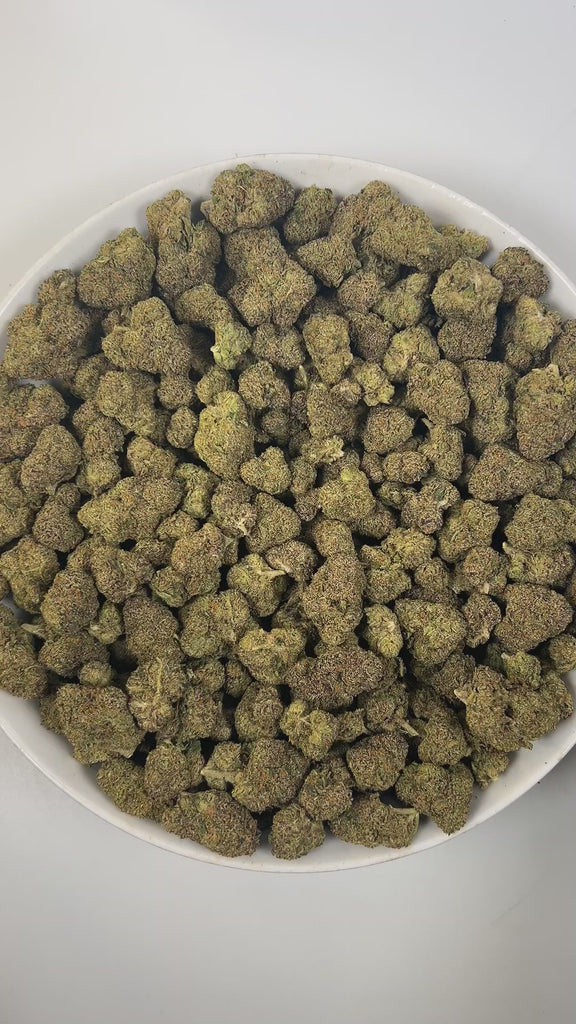 PUFFY Bacio Gelato is a premium balanced hybrid THCa strain born from the legendary cross of Sunset Sherbert and Thin Mint Girl Scout Cookies. The aroma is a rich and intriguing blend of sweet licorice, decadent chocolate, and pungent gassy undertones. Visually, buds are dense and chunky, with forest green and purple tones, fiery orange pistils, and a frosty trichome coating. Consumers describe it as gentle yet uplifting, providing clear-headed calm and a subtle mood boost that eases tension while keeping y