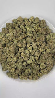 PUFFY Casper OG is an indica-dominant hybrid THCa strain, emerged from the formidable union of Face Off OG and Ghost OG Oreoz. The aroma is a bold and invigorating blend of fresh pine, sharp diesel, and earthy herbal notes, creating a distinctive and memorable scent experience. Visually, dense pistachio green buds with purple hues and fiery orange pistils are coated in sticky trichomes. Consumers often report experiencing deep relaxation, a sense of happiness, an uplifted mood, and a calm, sleepy feeling.