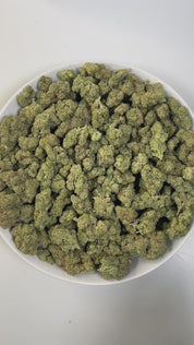 PUFFY Durban Dream is a sativa-dominant hybrid THCa strain, born from a legendary cross of Durban Poison and Blue Dream. The aroma is a rich blend of sweet blueberry, sharp pungent notes, and earthy herbal undertones, creating an inviting and complex scent profile. Visually, dense green buds with purple hues and fiery orange pistils are coated in sticky trichomes. Consumers often report a balanced experience, combining uplifting mental clarity and focus with a gentle body calmness, making it ideal for dayti