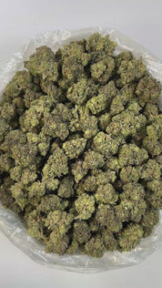 PUFFY Frozen Black Cherry is a potent indica-dominant hybrid THCa strain crafted from the flavorful cross of Black Cherry Gelato and Frozen Margy. This strain boasts a rich, layered aroma profile that blends creamy notes with hints of tropical fruit and a gassy undertone. Visually appealing, its dense, solid buds are blanketed in frosty trichomes and often display deep purple hues, making it as beautiful as it is effective. Consumers often report a deeply relaxing, euphoric, and heavily sedative experience,