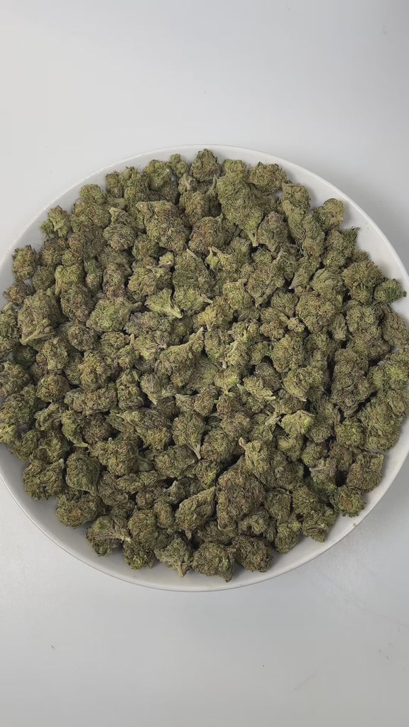 PUFFY Lemon Cherry Gelato is an indica-dominant  hybrid THCa strain, expertly crafted from a potent cross between Sunset Sherbet and Girl Scout Cookies. The aroma is a delightful blend of cherry, sweet, and creamy notes, creating an inviting and luscious scent that instantly captivates the senses. Visually, buds are dense and frosty, featuring deep green and purple hues with bright orange pistils and a thick coating of sparkling trichomes. Consumers often report an initial wave of uplifted, happy euphoria, 