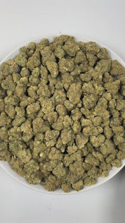 PUFFY Blue Dream is a sativa-dominant hybrid THCa strain born from the legendary cross between Blueberry and Haze. The aroma delights the senses with sweet notes of blueberry, complemented by fresh herbal undertones and a subtle, peppery kick. Visually stunning, its dense, bright green buds are accented by deep blue hues, fiery orange pistils, and a generous dusting of icy trichomes making it as eye-catching as it is effective. Consumers often report a euphoric, uplifting head high that flows into a gentle,