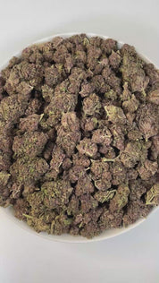 PUFFY Tropical Cherry is a sativa-dominant hybrid THCa strain, typically bred by crossing Tropicana Cookies with Cherry Cookies. The aroma bursts with sweet, fruity notes layered with juicy, tropical richness, creating an inviting and refreshing scent. Visually, the buds are dense and oversized, showcasing deep purple and green tones accented by bright orange pistils and a frosty trichome layer. Consumers often report a vibrant, uplifting high that boosts mood, sparks creativity, and enhances focus while of